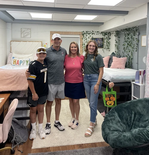 Family visiting dorm room 